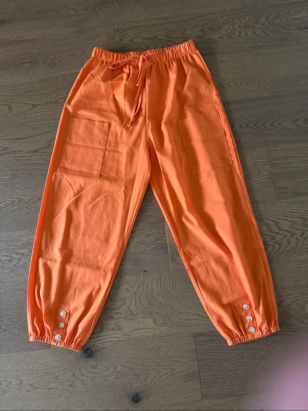 Never worn. New! Bright Orange Drawstring Joggers